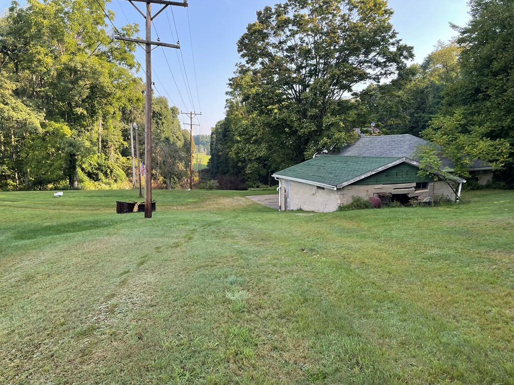 983 Lawsonham Road Rimersburg, PA 16248 - Photo 7 of 51 a view of a house with a yard and sitting area