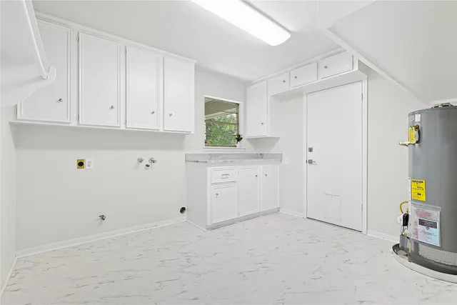 a view of an empty room with a fan