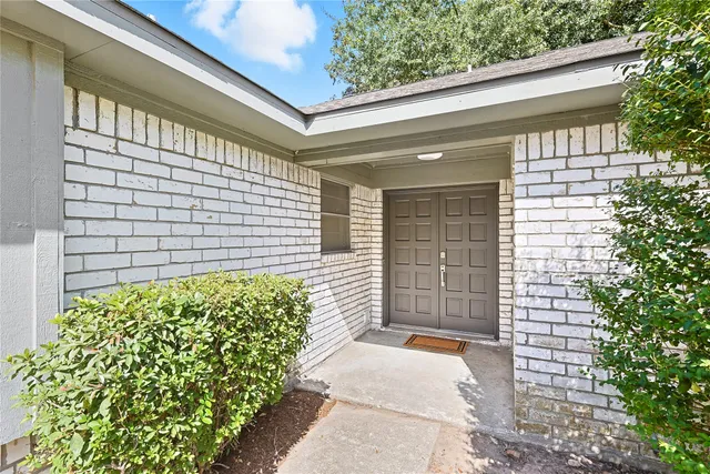 a view of a pathway both side of house