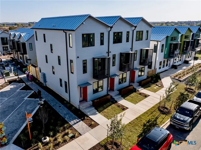 a view of a house with many windows