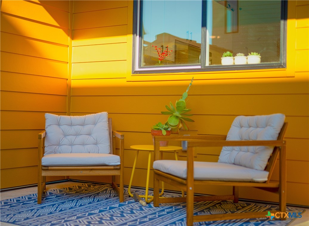 1909 Dutton Drive, Unit B San Marcos, TX 78666 - Photo 17 of 25 a view of a brick house with wooden floor