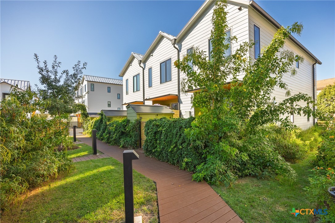 1909 Dutton Drive, Unit B San Marcos, TX 78666 - Photo 23 of 25 a view of a back yard of the house
