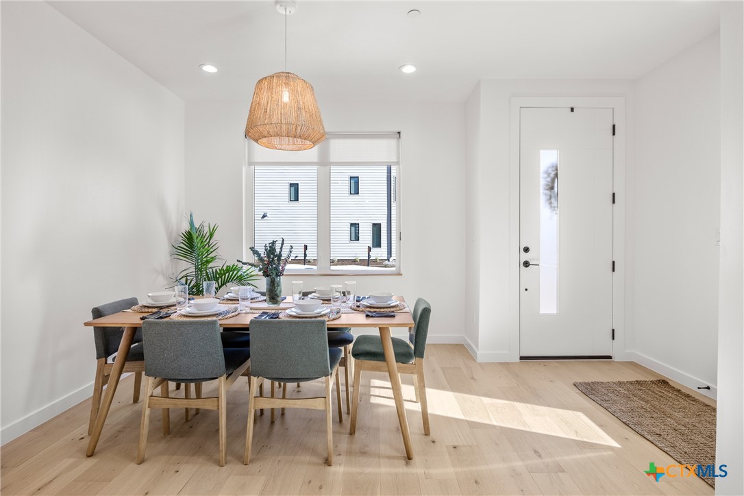 1909 Dutton Drive, Unit B San Marcos, TX 78666 - Photo 8 of 25 a view of a livingroom with furniture and window