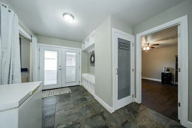 wooden floor with a bedroom