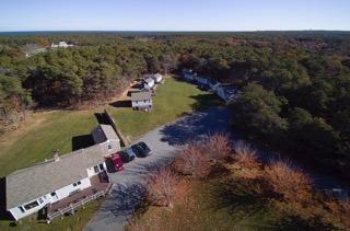 121 Shore Road, Unit 2 Truro, MA 02666 - Photo 6 of 6 an aerial view of a houses with outdoor space