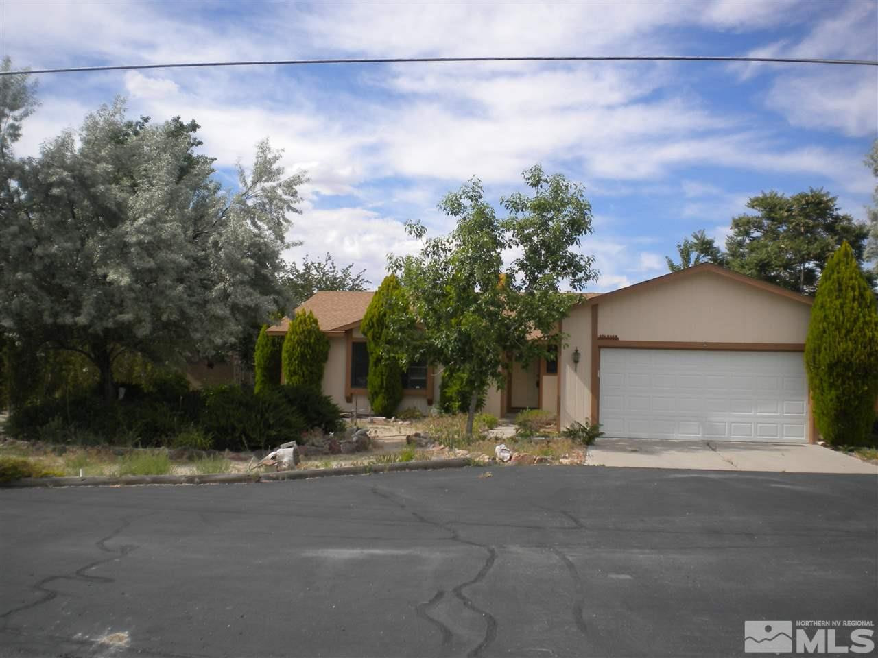 876 Rice Road Fallon, NV 89406 - Photo 1 of 1 a view of a house with a street