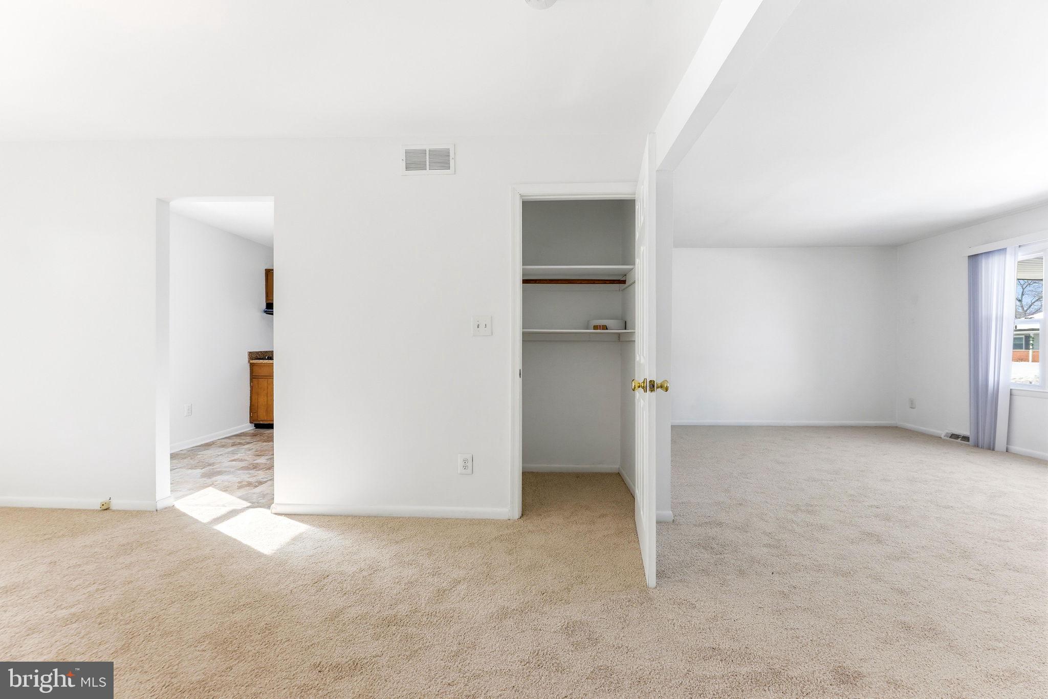 623 Chapelgate Drive Odenton, MD 21113 - Photo 13 of 24 an empty room with closet and windows