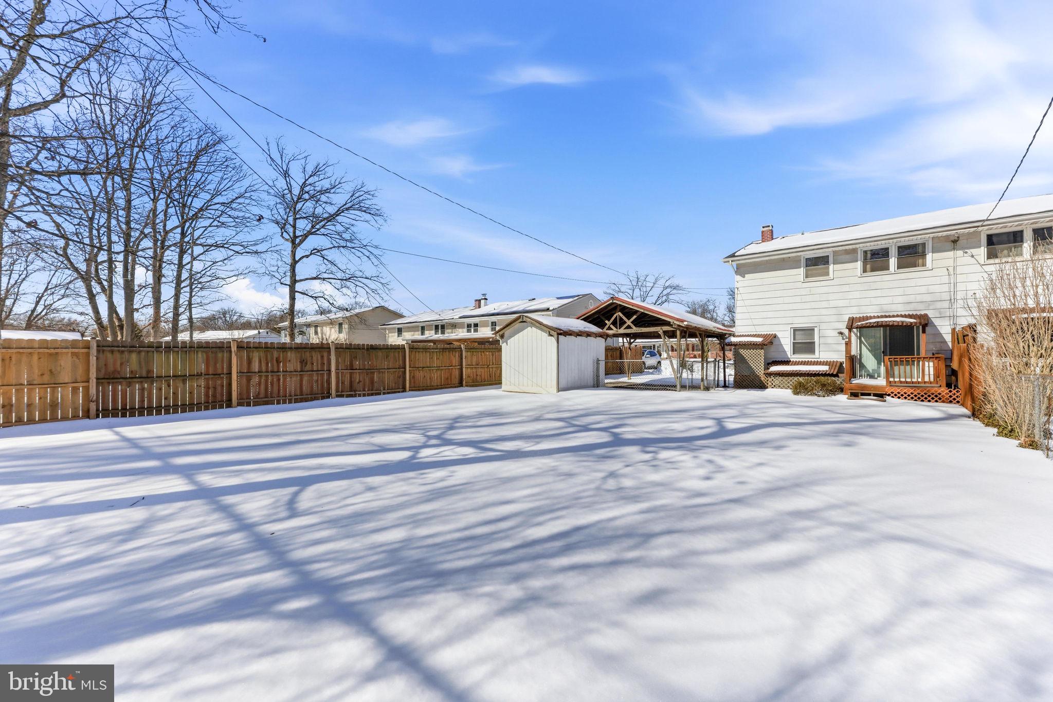 623 Chapelgate Drive Odenton, MD 21113 - Photo 22 of 24 a front view of a house with a yard