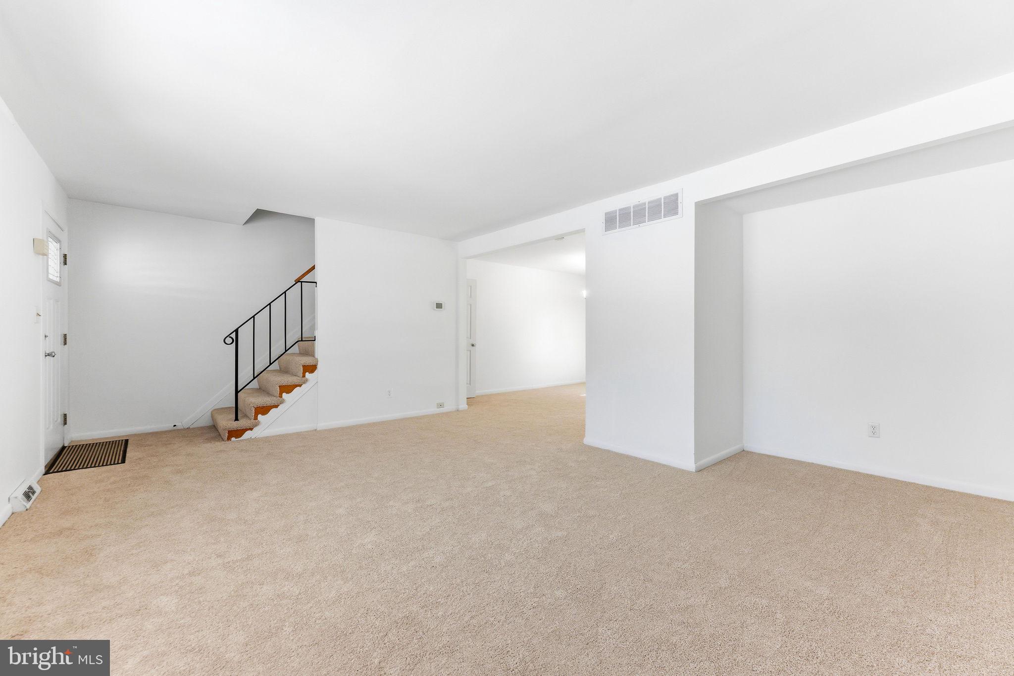 623 Chapelgate Drive Odenton, MD 21113 - Photo 4 of 24 a view of an empty room with stairs