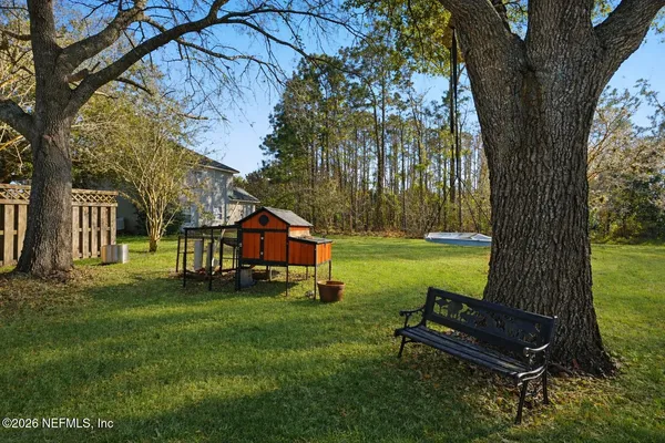 a garden view with a seating space