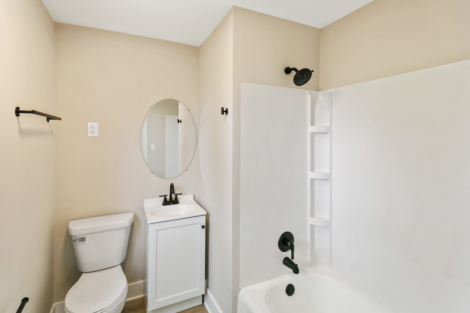 239 Cornwall Drive Crete, IL 60417 - Photo 23 of 25 a bathroom with a sink a toilet and shower
