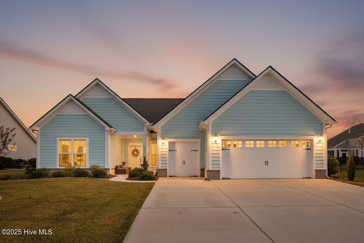 9162 Oldfield Road Calabash, NC 28467 - Photo 2 of 36 9162OldefieldRoad-2_Dusk_02