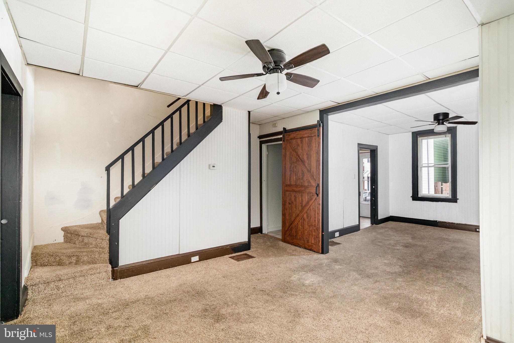 248 South 5th Street Lebanon, PA 17042 - Photo 16 of 35 Spacious living area with charming staircase.