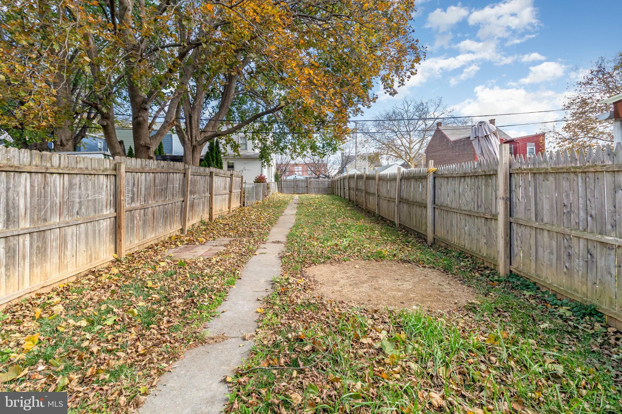 248 South 5th Street Lebanon, PA 17042 - Photo 33 of 35 Serene pathway through a leafy backyard.
