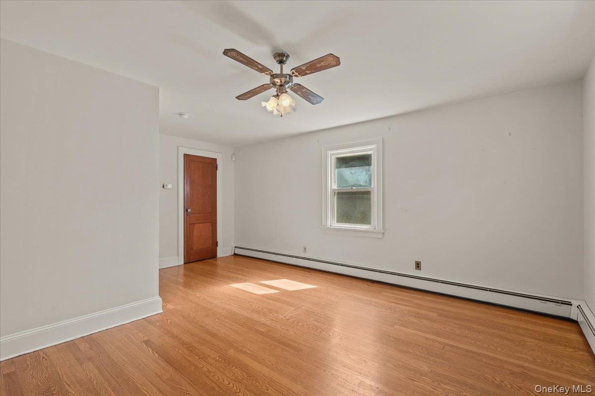 13 Washburn Road Mount Kisco, NY 10549 - Photo 17 of 27 Primary Bedroom with view toward walk-in closet