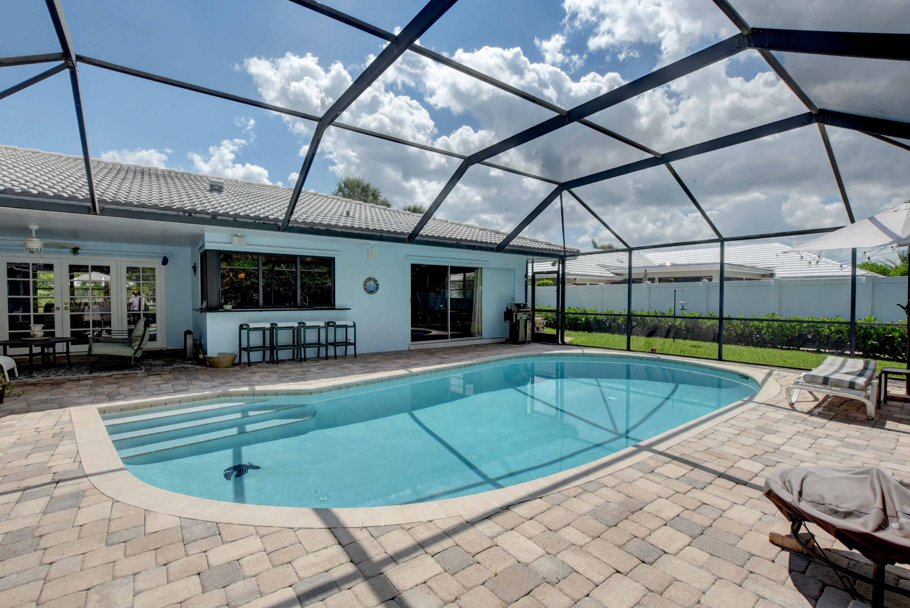 727 Apple Tree Lane Boca Raton, FL 33486 - Photo 32 of 42 Back view of pool