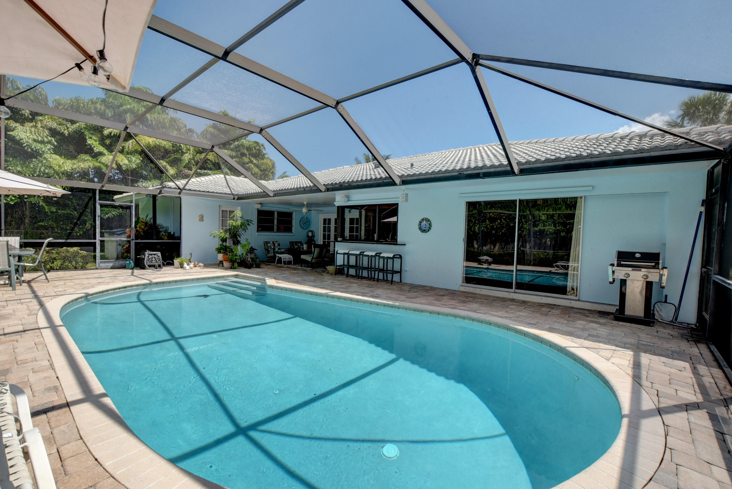 727 Apple Tree Lane Boca Raton, FL 33486 - Photo 33 of 42 Back view of house pool
