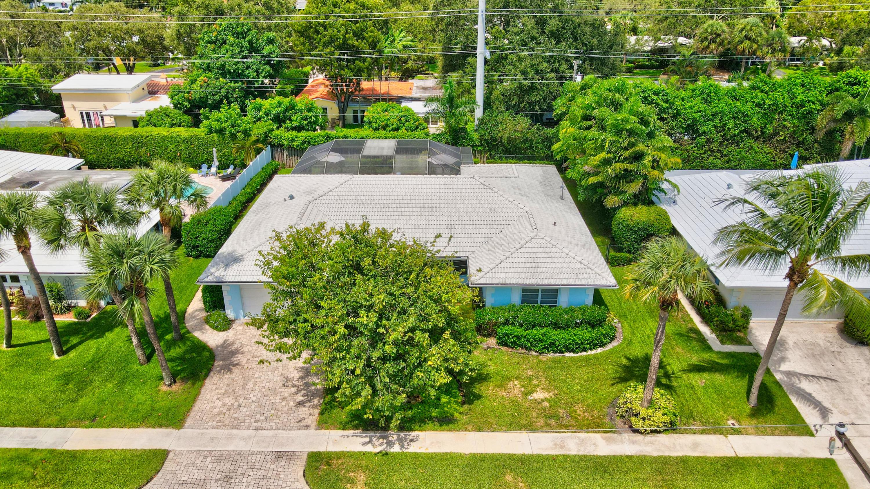 727 Apple Tree Lane Boca Raton, FL 33486 - Photo 41 of 42 drone front of house