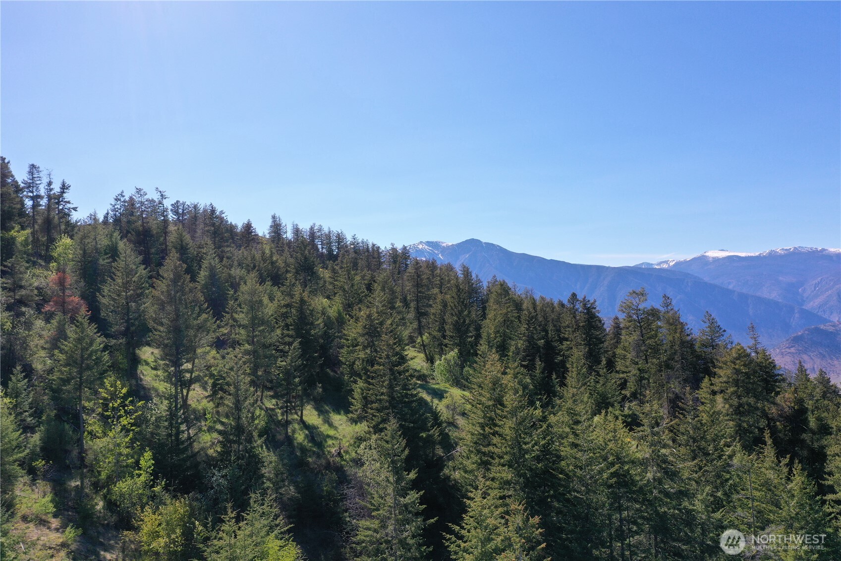 111 Ellemeham Mountain Road Oroville, WA 98844 - Photo 17 of 32 a view of a city with mountain