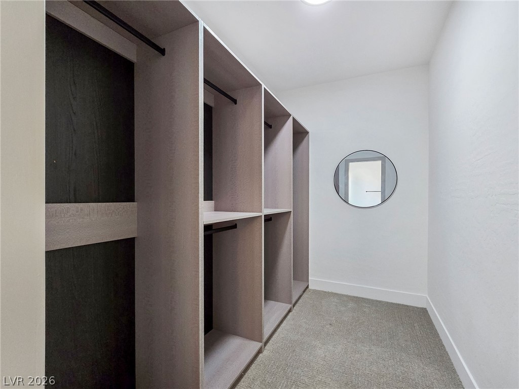 1120 West Gamebird Road Pahrump, NV 89048 - Photo 34 of 36 Spacious closet with light colored carpet