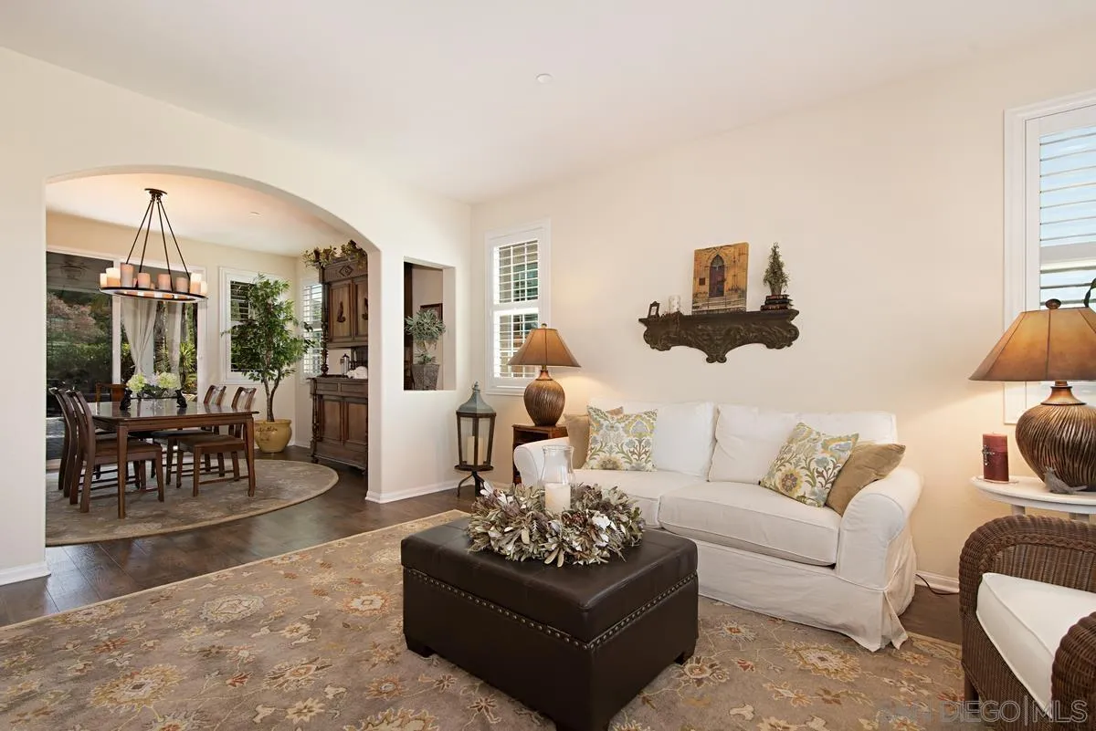 1121 Ocean Ridge Court Oceanside, CA 92056 - Photo 4 of 30 a living room with furniture or couch and a wooden floor