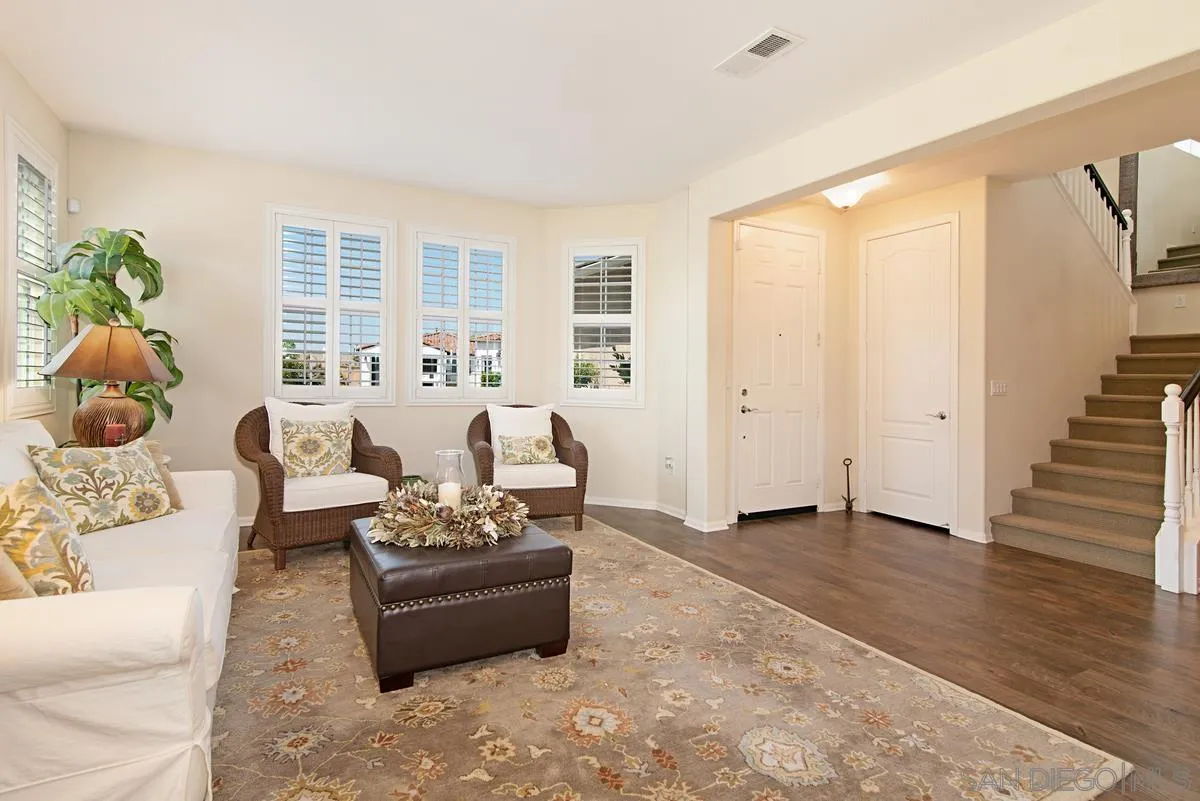 1121 Ocean Ridge Court Oceanside, CA 92056 - Photo 6 of 30 a living room with furniture and wooden floor