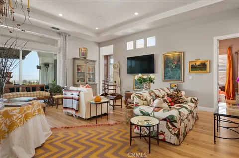a bedroom with a bed chair and window