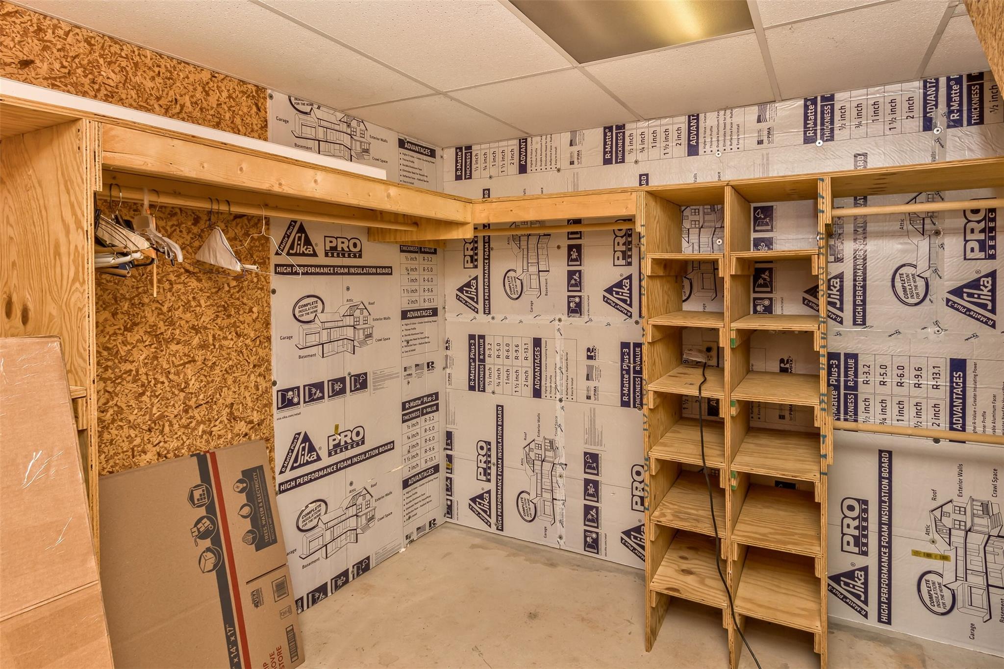 124 Beaverdam Loop Road Candler, NC 28715 - Photo 24 of 25 a utility room with lot of cabinets