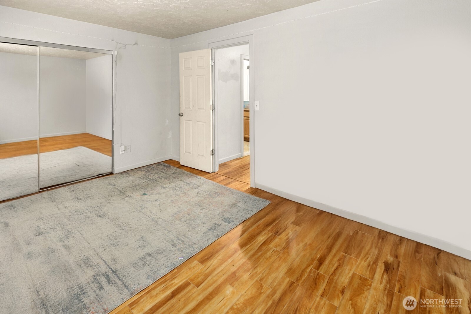 101 Southwest 119th Street, Unit 102 Burien, WA 98146 - Photo 12 of 15 a view of an empty room