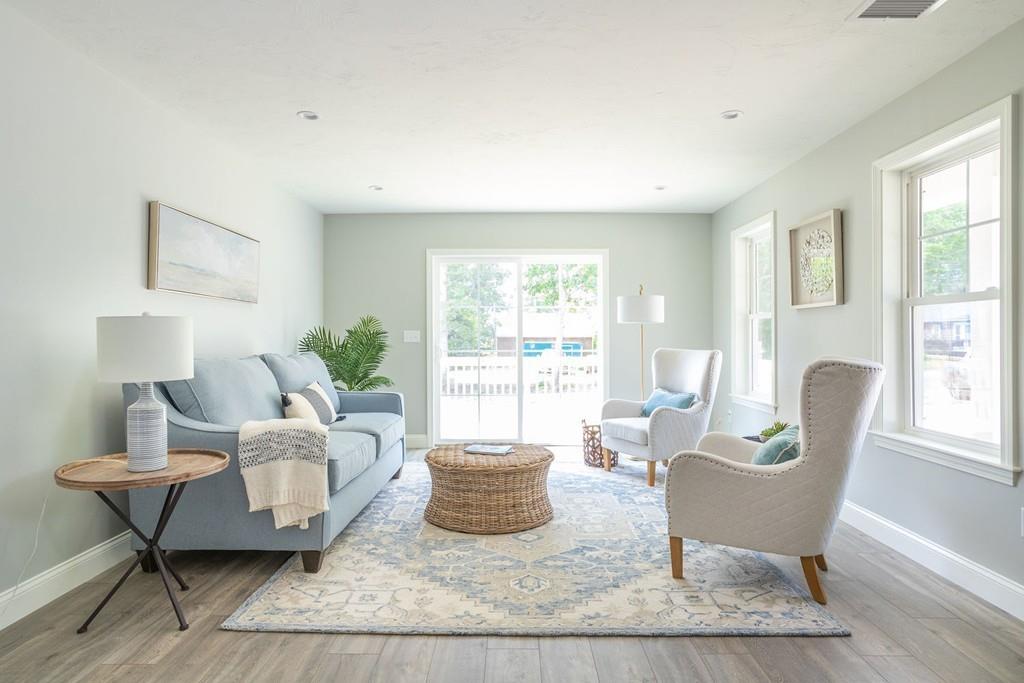 11 Indian Neck Road Wareham, MA 02571 - Photo 11 of 41 a living room with furniture and a window
