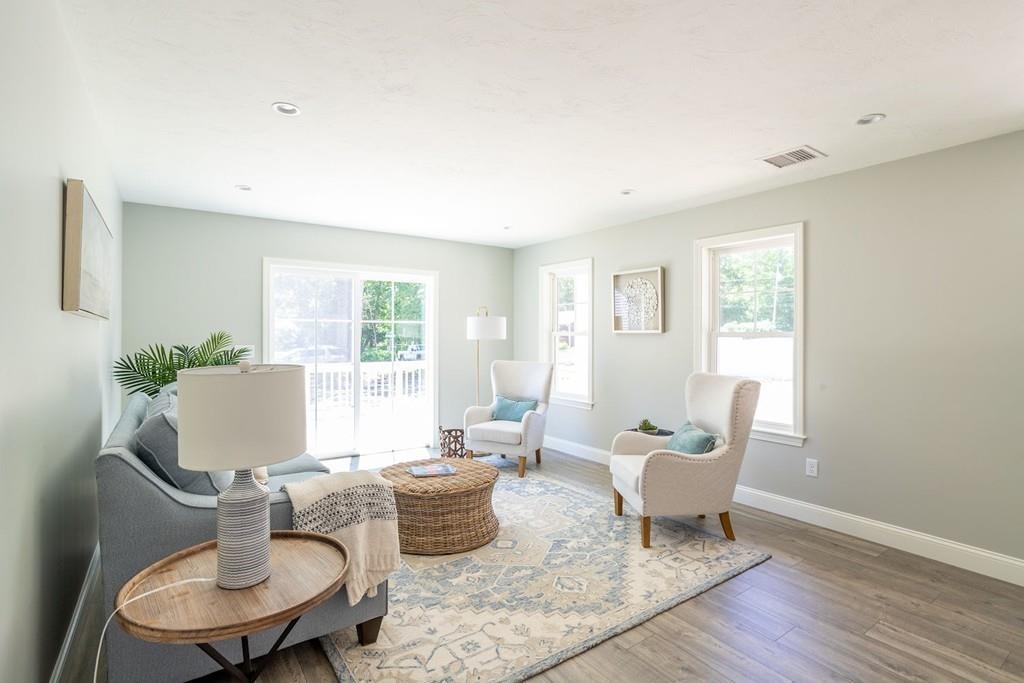 11 Indian Neck Road Wareham, MA 02571 - Photo 13 of 41 a living room with furniture and a window