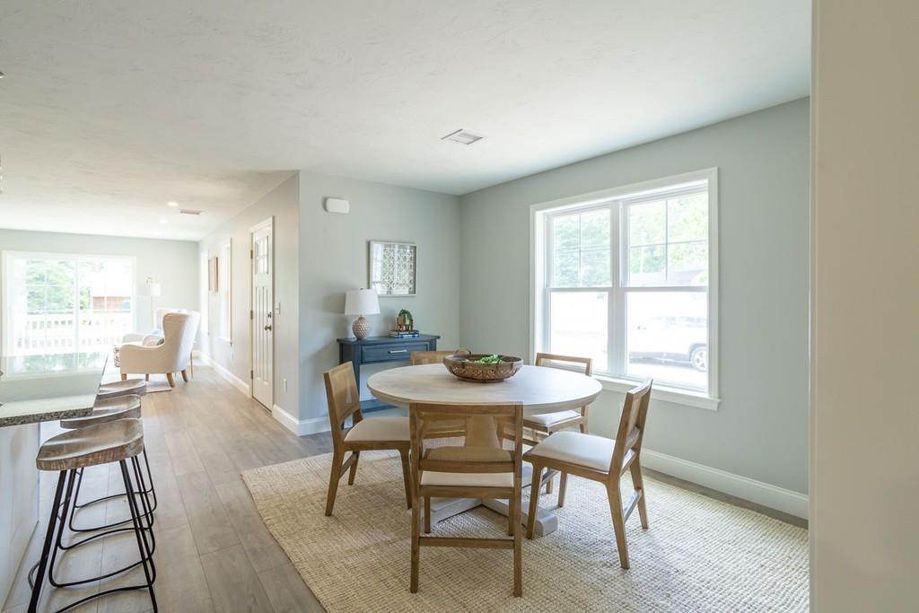 11 Indian Neck Road Wareham, MA 02571 - Photo 18 of 41 a view of a dining room with furniture and a window