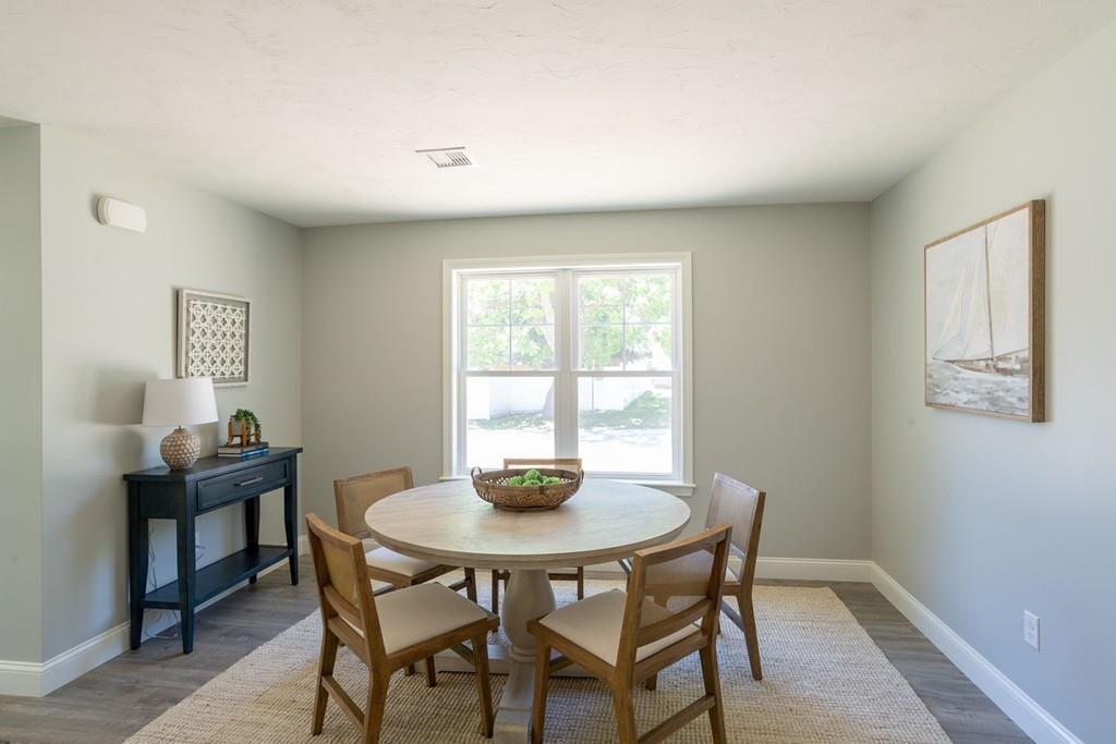 11 Indian Neck Road Wareham, MA 02571 - Photo 20 of 41 a dining room with furniture and window