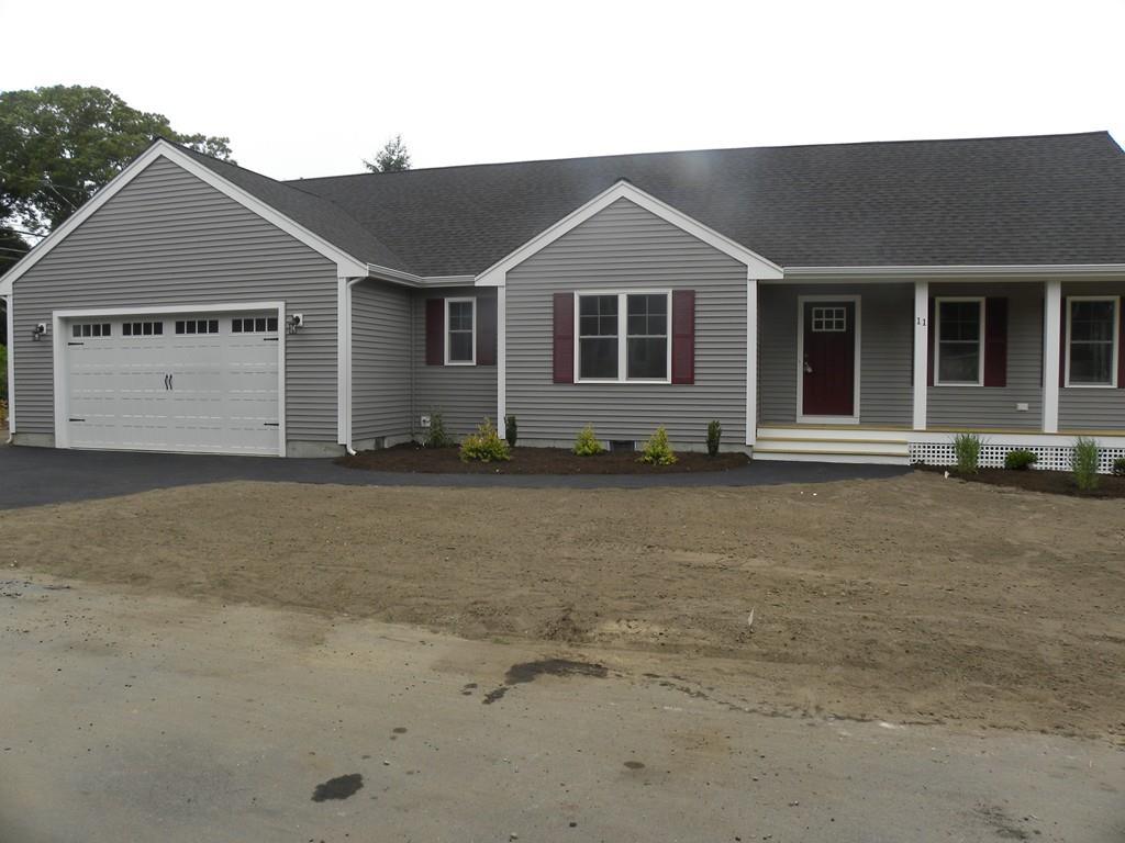 11 Indian Neck Road Wareham, MA 02571 - Photo 2 of 41 a front view of a house with a yard