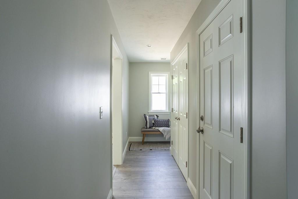 11 Indian Neck Road Wareham, MA 02571 - Photo 25 of 41 a view of a hallway with a livingroom and a bathroom