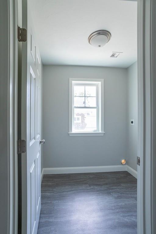 11 Indian Neck Road Wareham, MA 02571 - Photo 26 of 41 an empty room with wooden floor and windows
