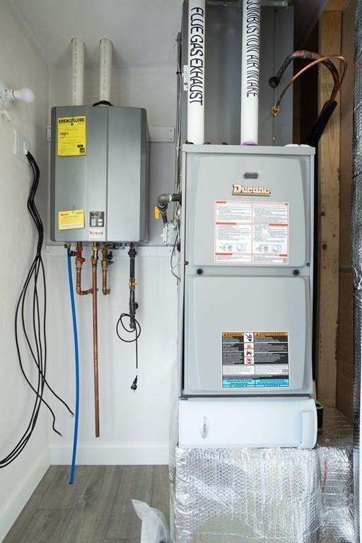11 Indian Neck Road Wareham, MA 02571 - Photo 27 of 41 a bathroom with a bathtub sink and mirror