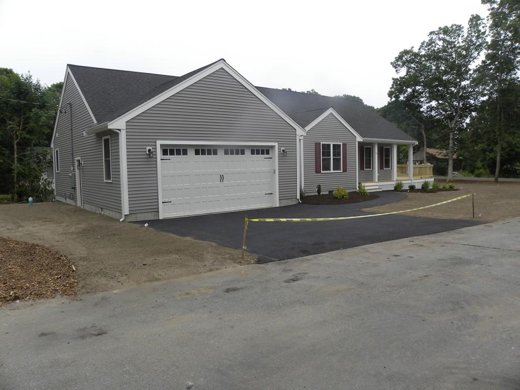 11 Indian Neck Road Wareham, MA 02571 - Photo 5 of 41 front view of a house with a yard