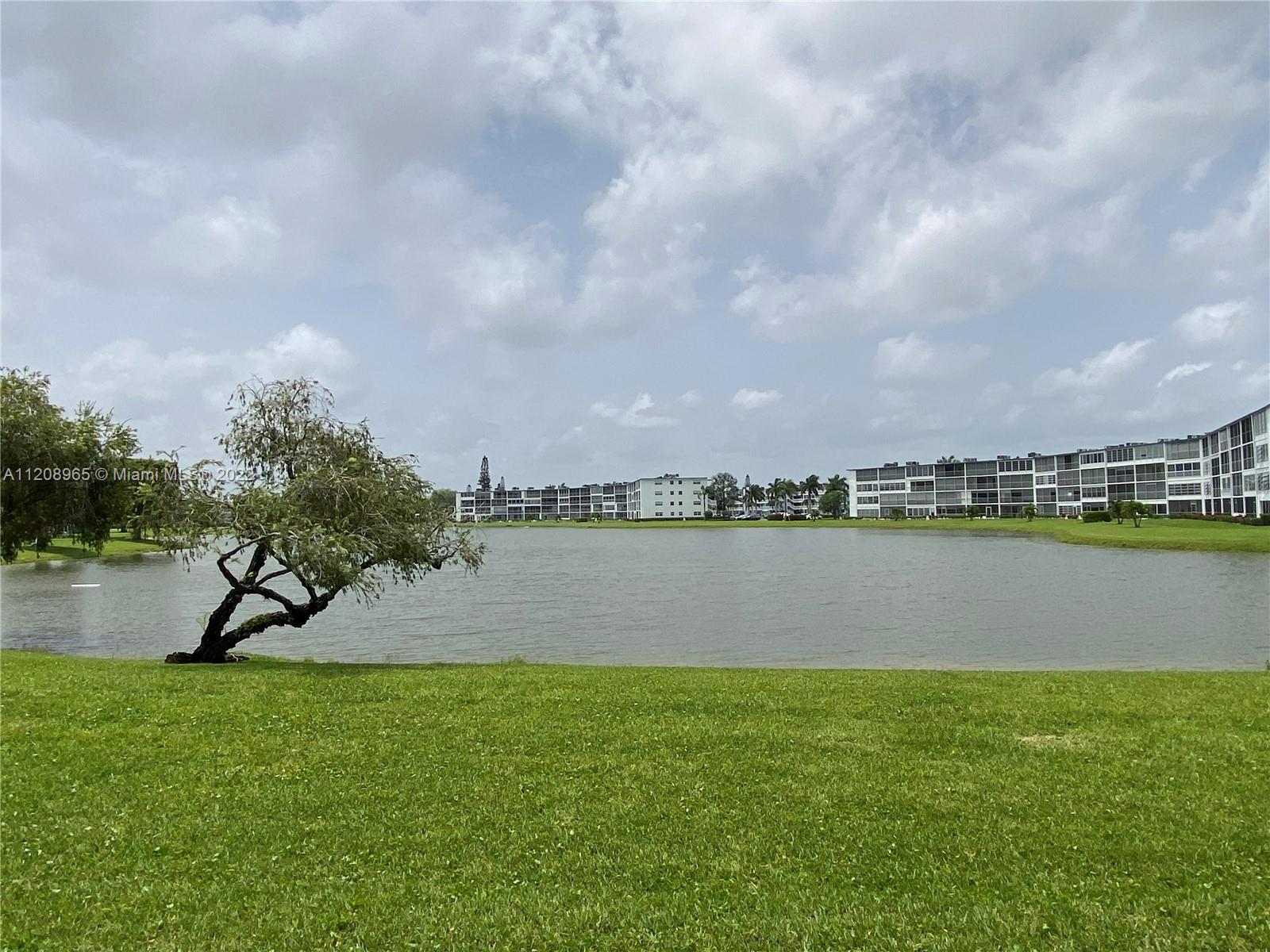 1058 Guildford East, Unit 1058 Boca Raton, FL 33434 - Photo 14 of 14 a view of a lake