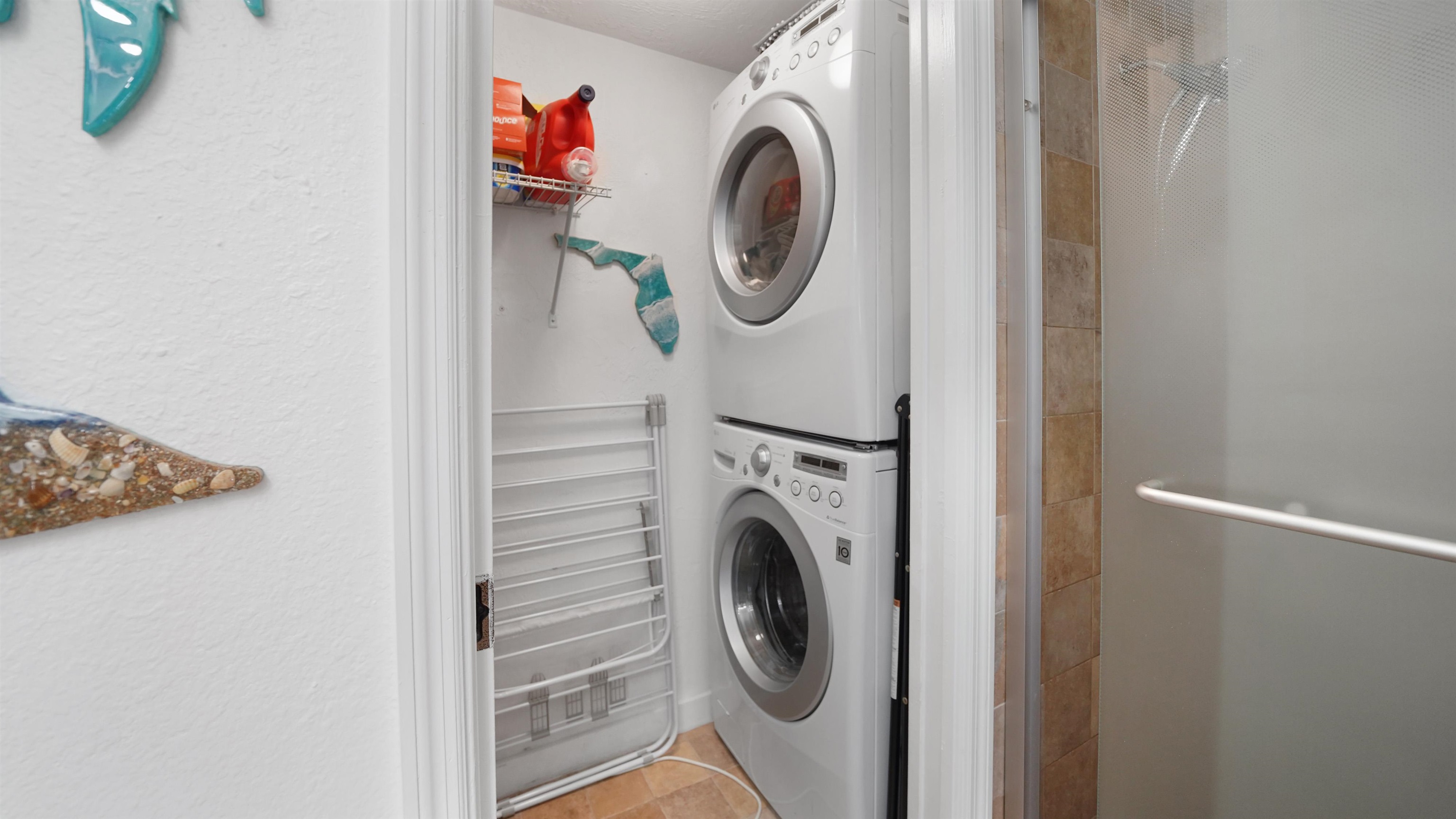 111 South 18th Street Flagler Beach, FL 32136 - Photo 11 of 38 a utility room with dryer and washer