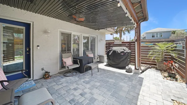 a view of a porch with seating space
