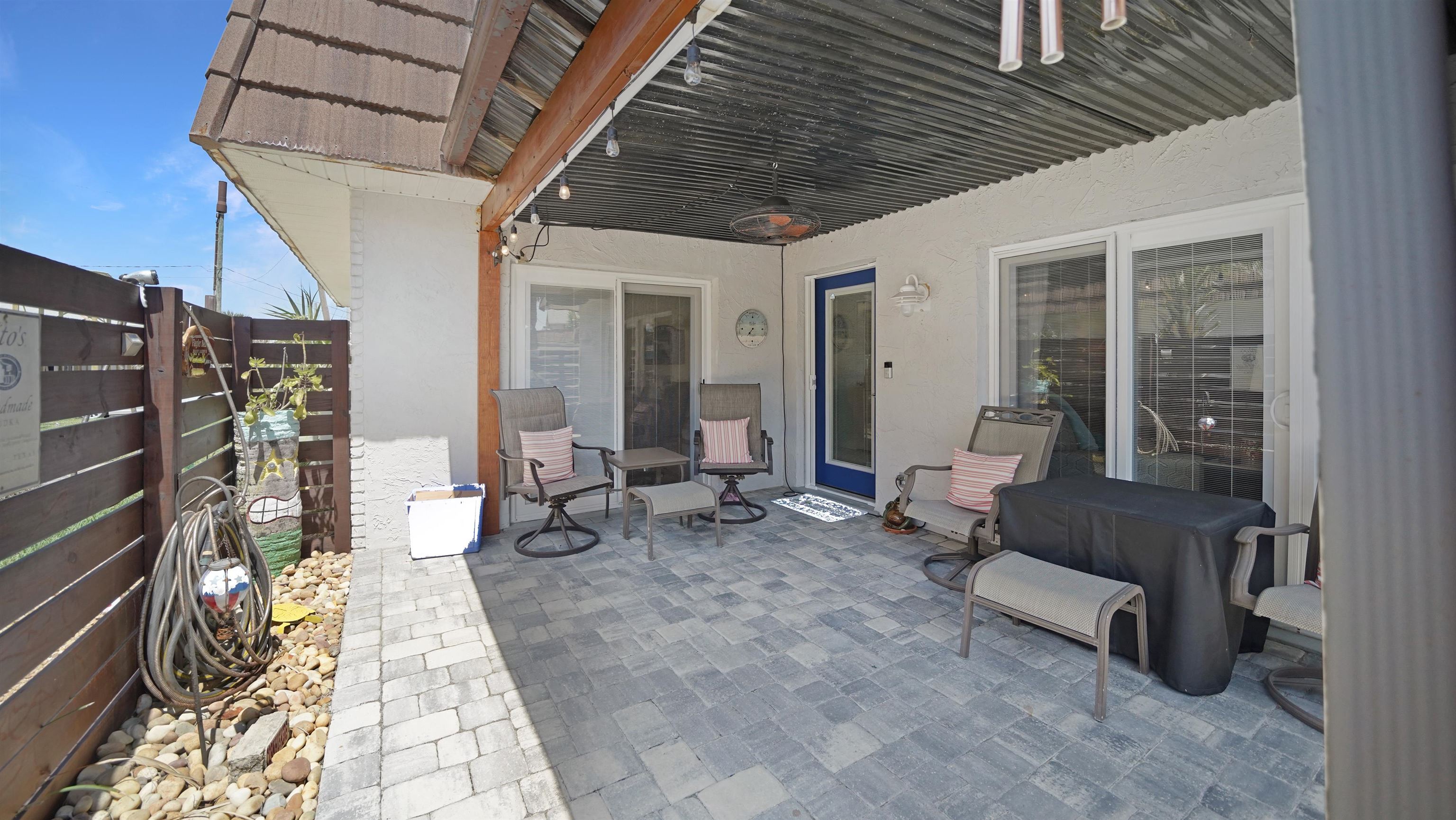 111 South 18th Street Flagler Beach, FL 32136 - Photo 15 of 38 a living room with furniture and a potted plant