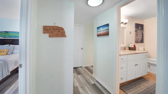 a bathroom with a sink a mirror and a toilet