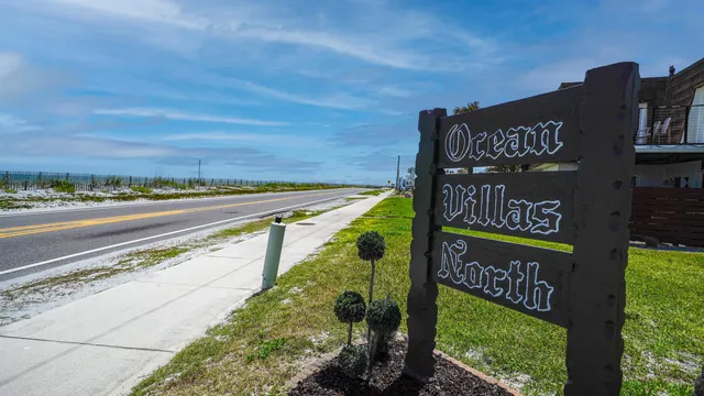 a view of a street with an outdoor space