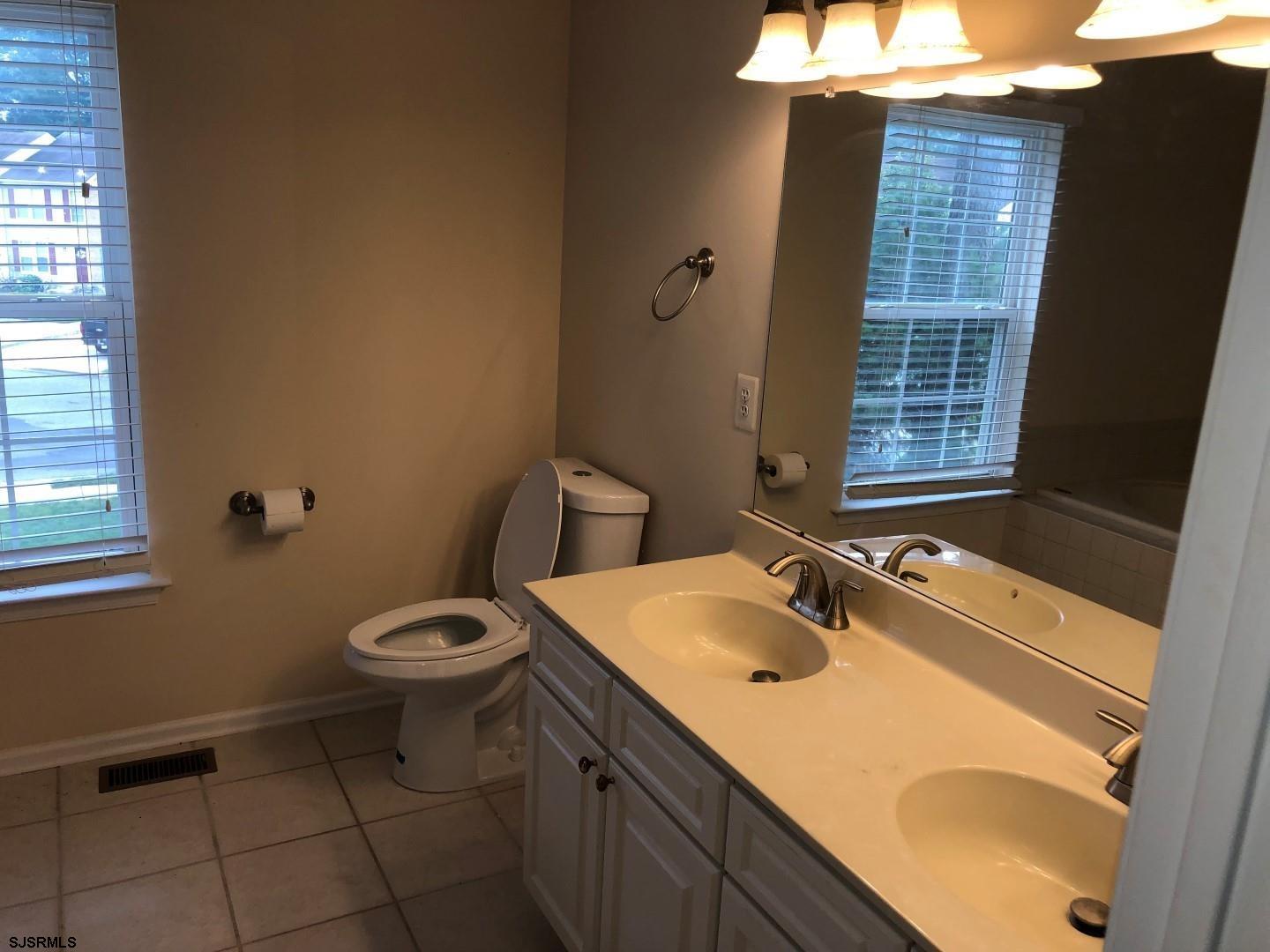 32 Summit Circle Mays Landing, NJ 08330 - Photo 13 of 31 a bathroom with a sink and a vanity
