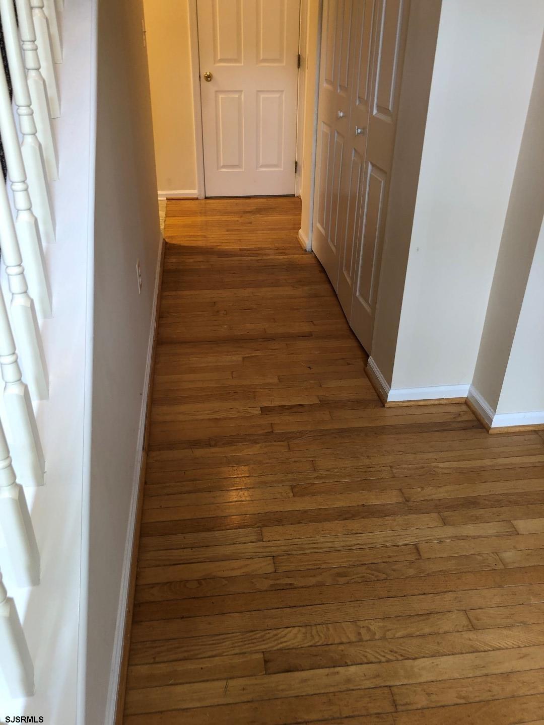 32 Summit Circle Mays Landing, NJ 08330 - Photo 2 of 31 a view of a hallway with wooden floor and staircase