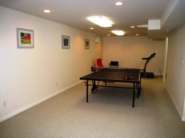 a room with furniture and a chandelier