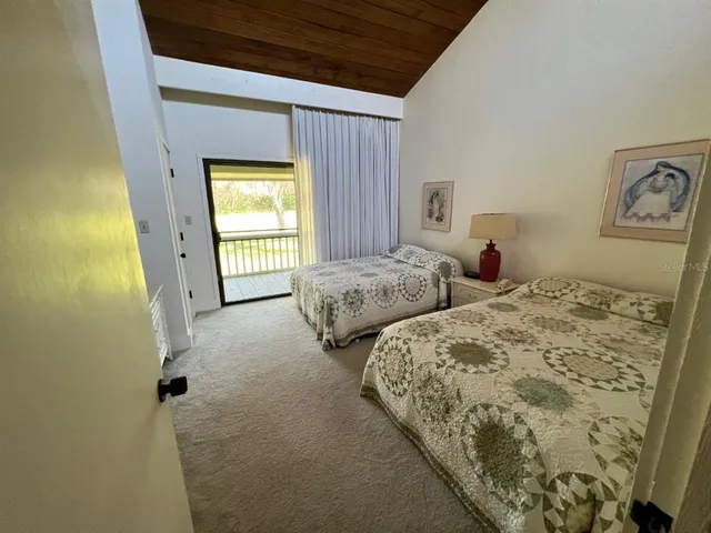 a view of bedroom with window