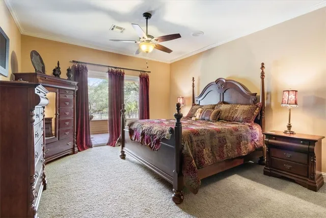 a spacious bathroom with double vanity and a mirror