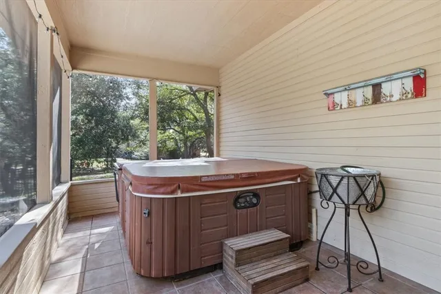 a lobby with furniture and a floor to ceiling window